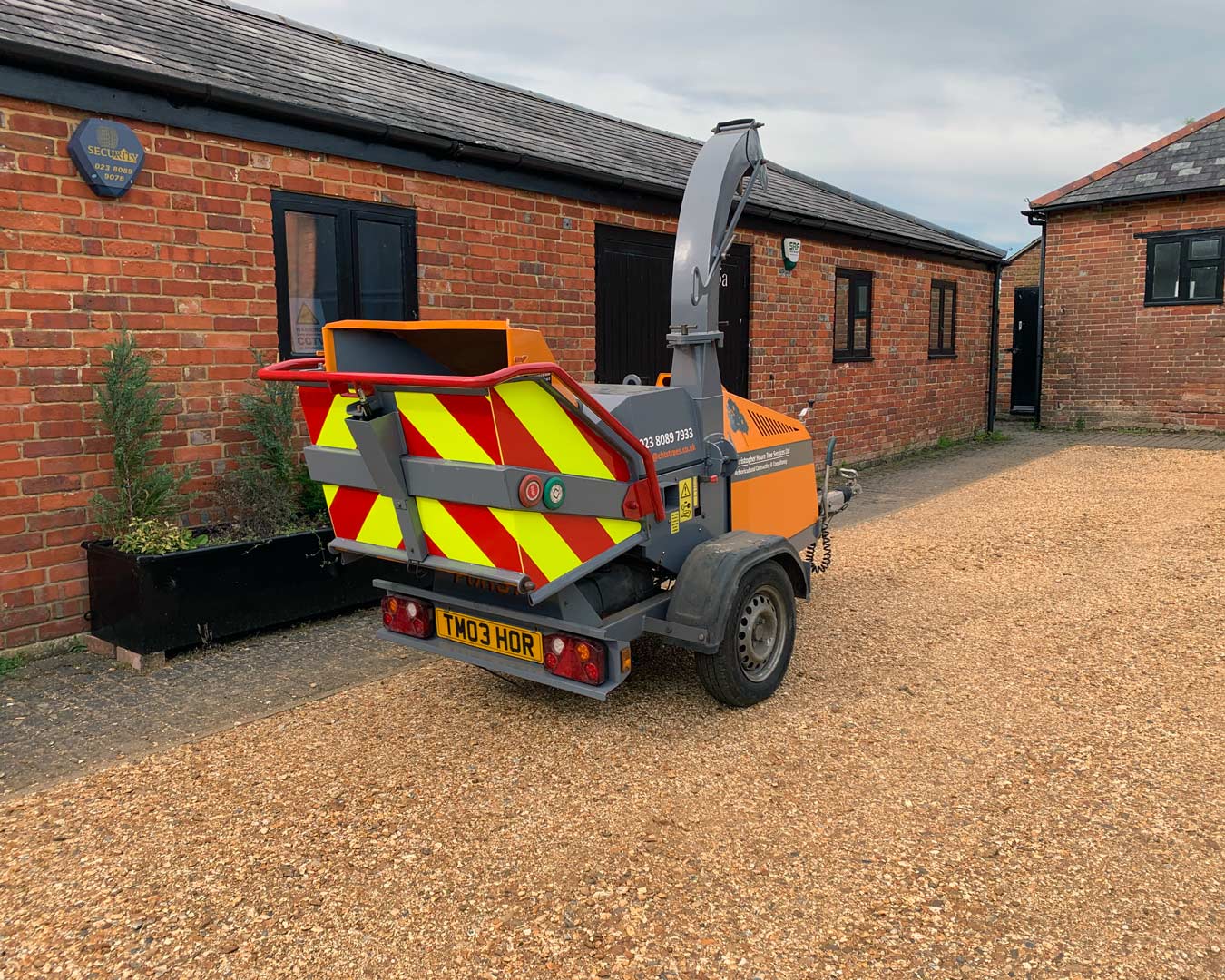 Christopher Hoare tree services chipper