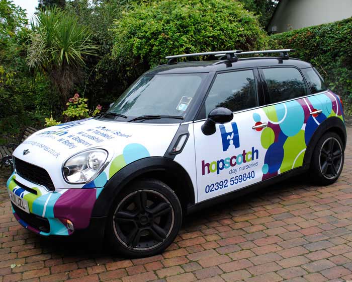 Vehicle wrap a mini that has been wrapped in vinyl