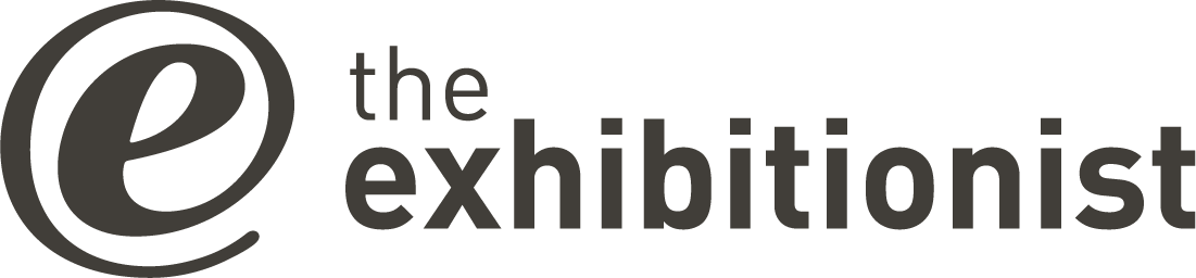 the exhibitionist logo in grey
